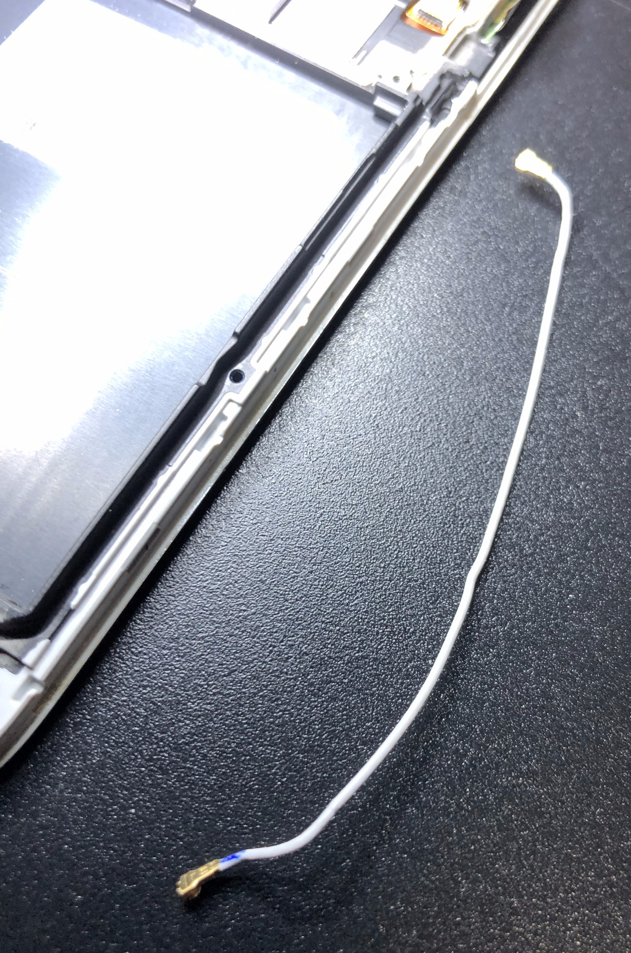 Remove the home button cable