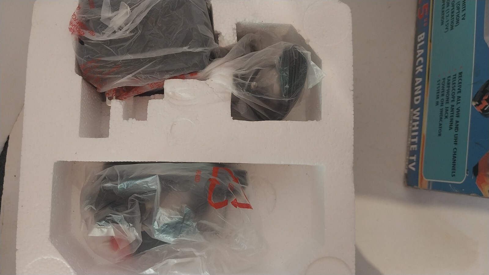 Figure 2c. Supersonic FC9600 - power adapter covered in plastic