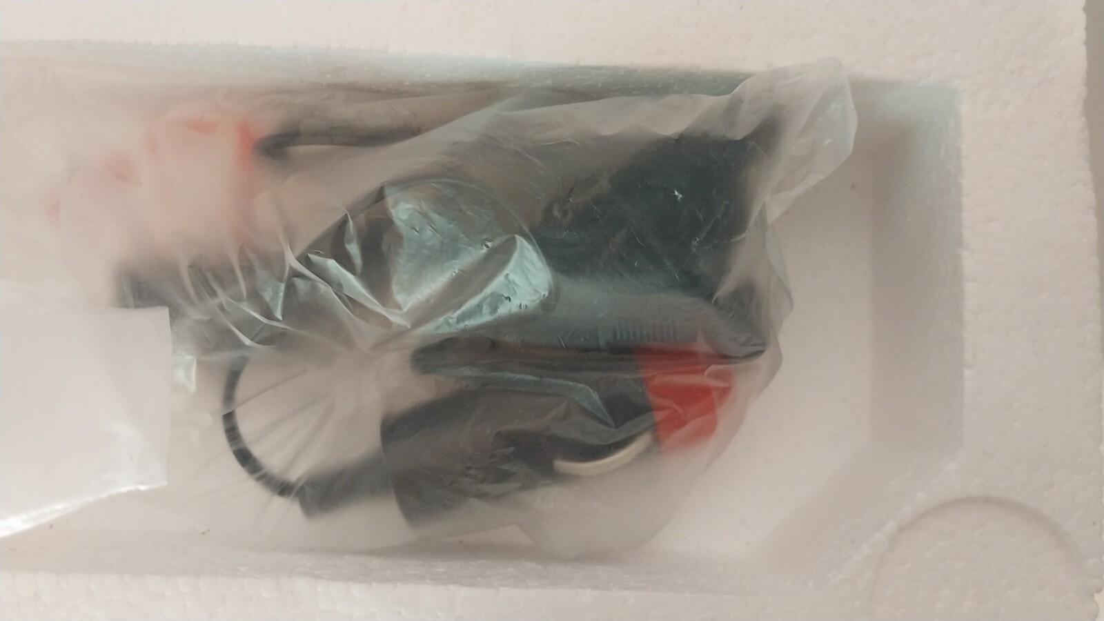 Figure 2d. Supersonic FC9600 - car charger covered in plastic